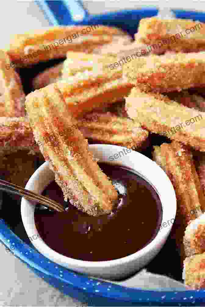 A Plate Of Freshly Made Churros With Chocolate Dipping Sauce Start Spanish Kitchen To Cook: Original Traditional Recipes With Chicken: Spanish Kitchen Food