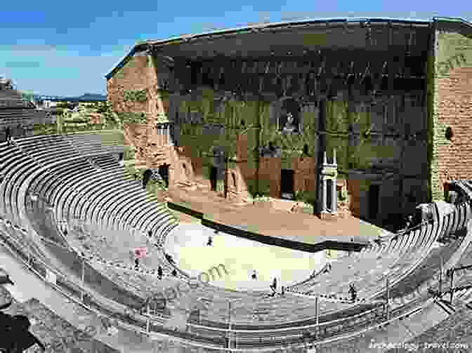 A Vibrant Image Of The Roman Theater In Orange, France, Showcasing Its Well Preserved Stage And Intricate Carvings. The Roman Remains Of Northern And Eastern France: A Guidebook