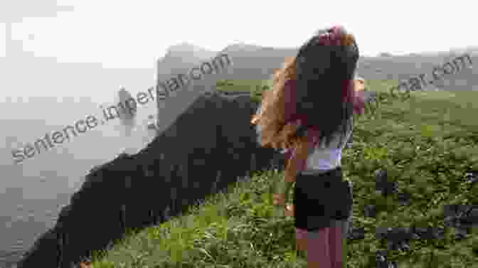 A Young Woman Standing On The Edge Of A Cliff, Looking Out At The Horizon POETIC JUICE: THE UNTOLD JOURNEY OF THE TRANSITION FROM GIRL TO WOMAN